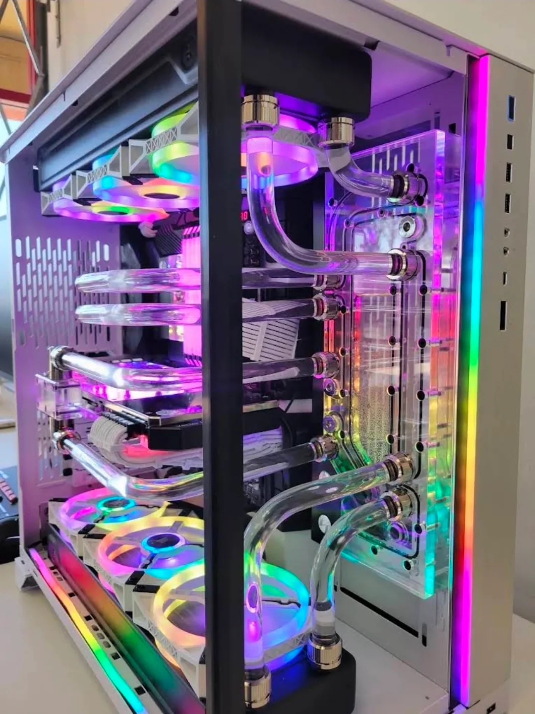 Lian Li custom gaming PC with clear hard-line water cooling and RGB fans
