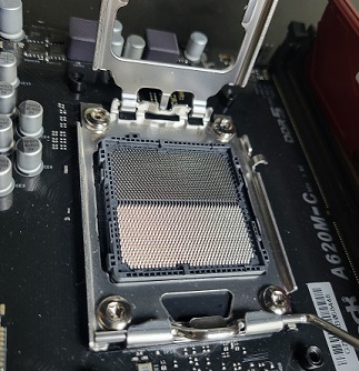 A motherboard CPU socket showing its delicate pin arrangement
